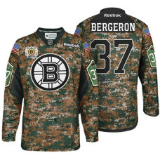 Military Appreciation Premier Boston Bruins #37 Patrice Bergeron Highest-Paid Player Camo Jersey